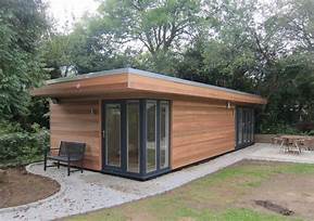 View of a cabin room in the garden of a home